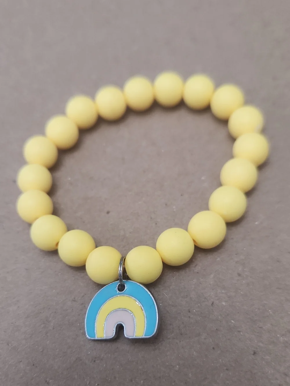 Yellow Beaded Kids Bracelet with Rainbow Charm